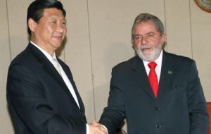President Luiz Inacio Lula da Silva (L) met  Vice President Xi Jinping in Brasilia.